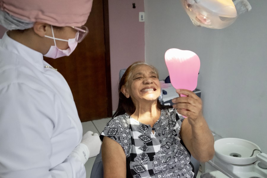 Elderly woman at dentist teeth cleaning